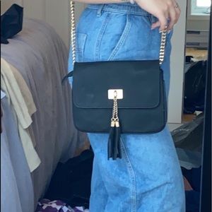 beautiful black shoulder bag.
